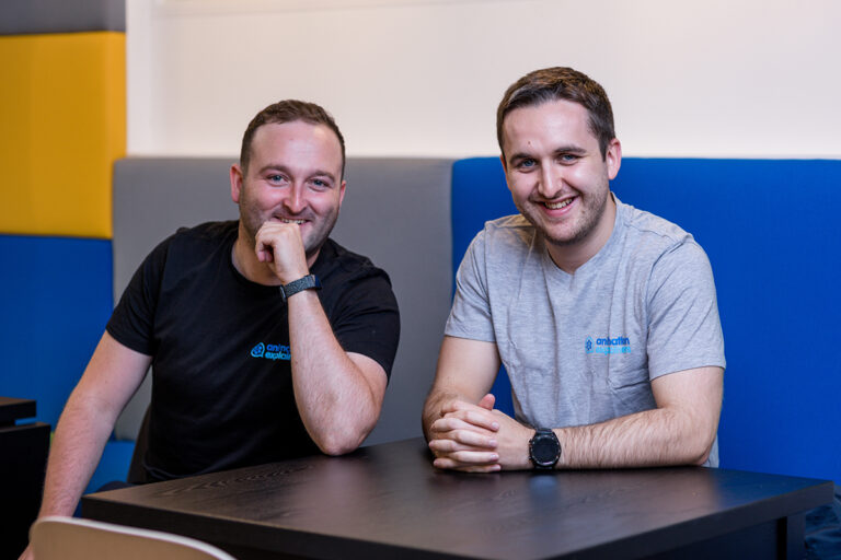 Two members of the Animation Explainers team in the studio
